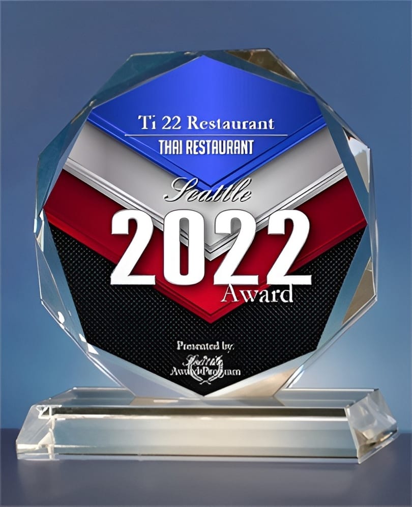 Ti 22 Restaurant Thai Restaurant Seattle 2022 Award, a crystal trophy with blue, red, and black accents.