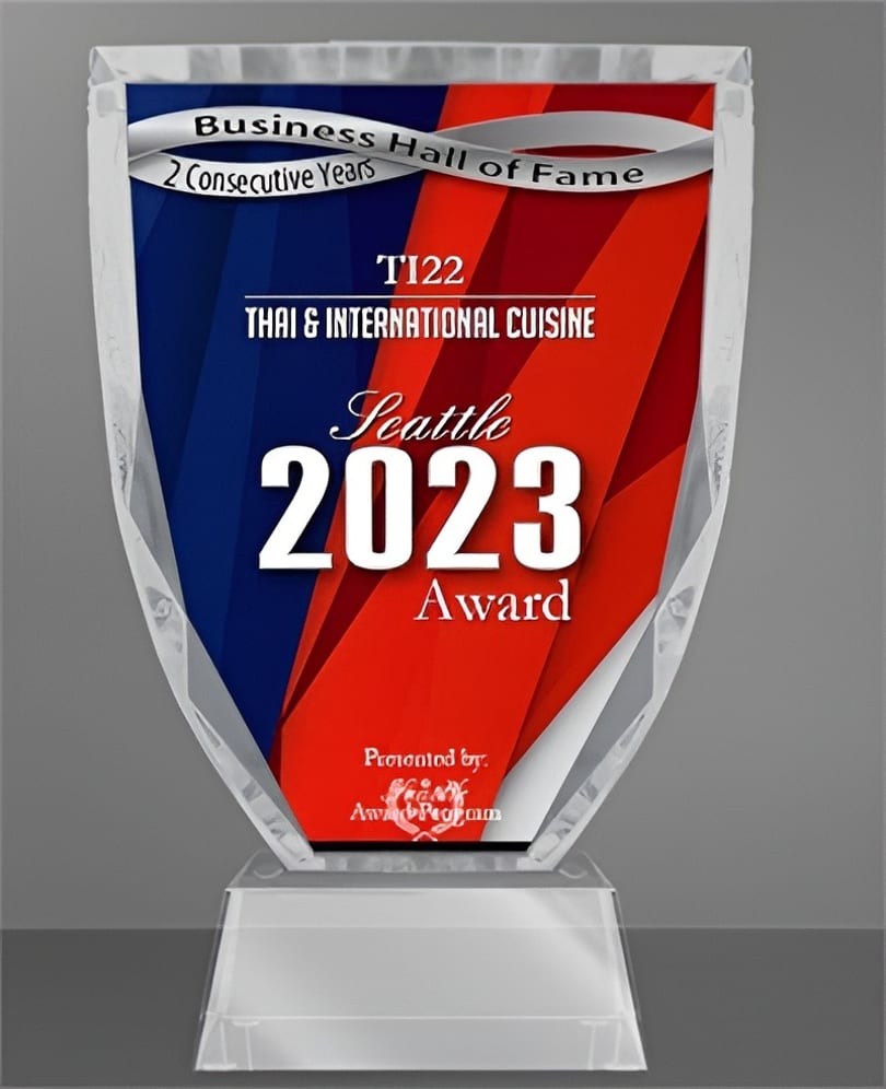 A clear acrylic award for "Business Hall of Fame" for "Thai & International Cuisine" in Seattle, 2023.